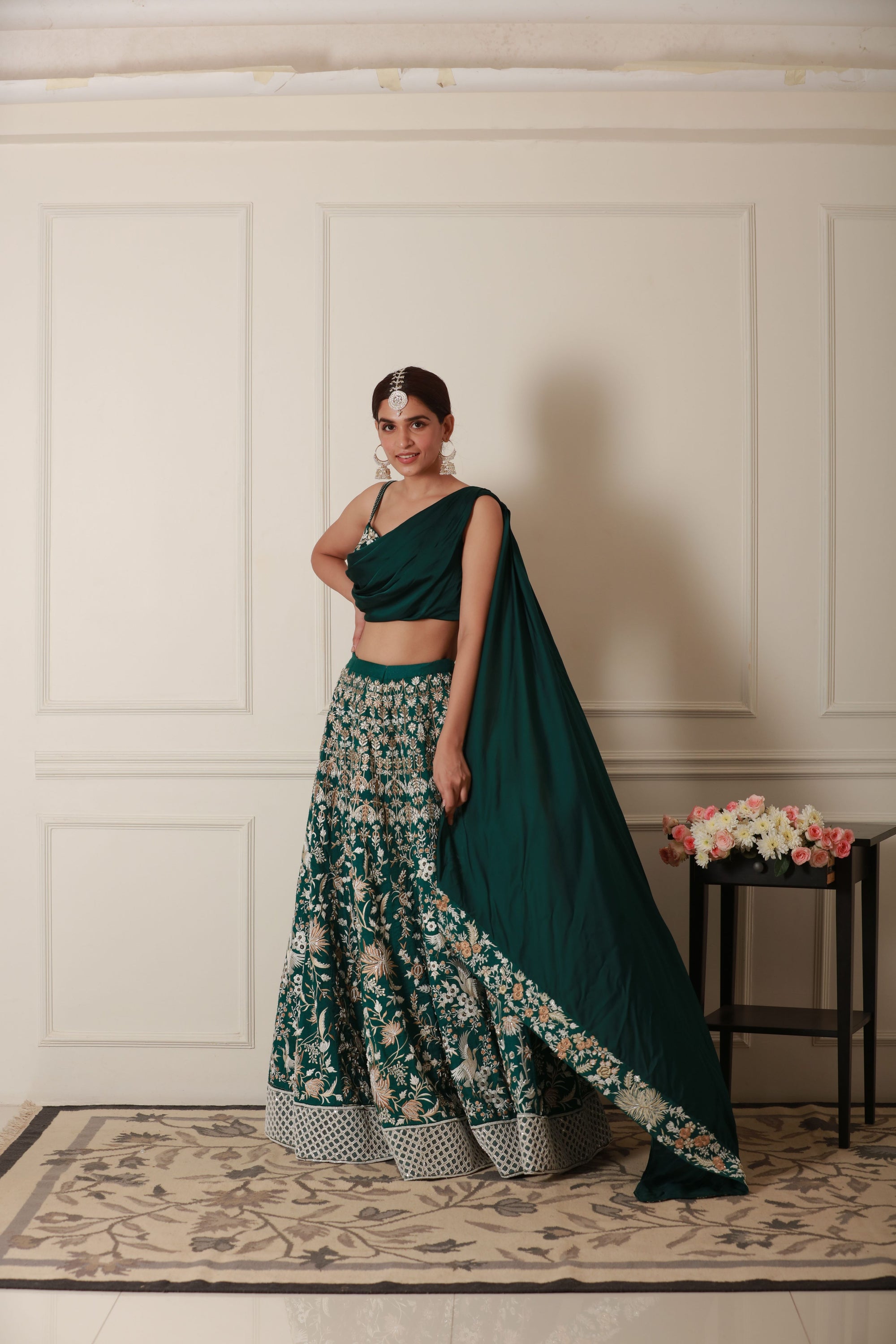 PRICILLA BOTTLE GREEN LEHENGA