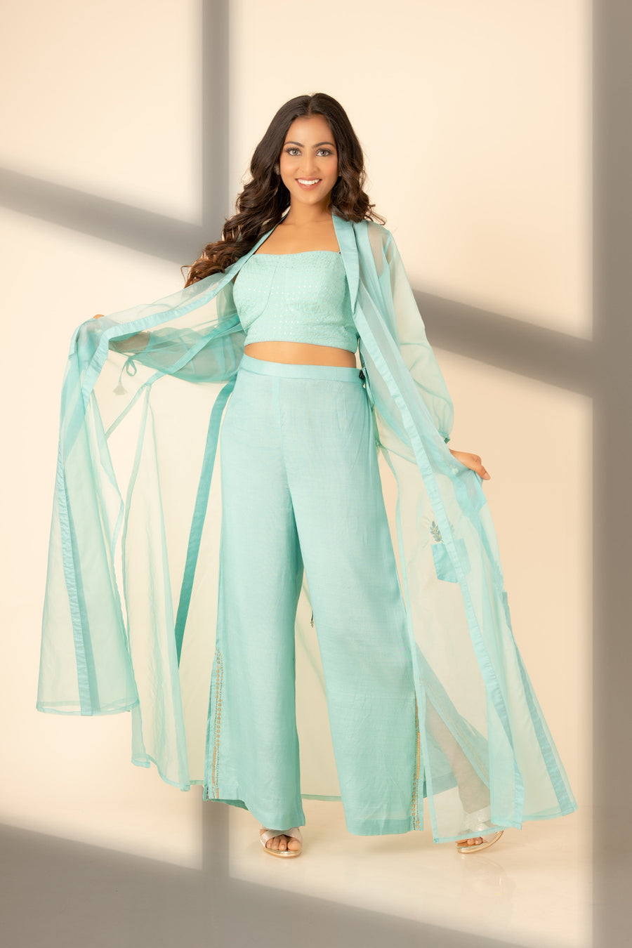 Sea green jacket with cotton bustier and flared pant