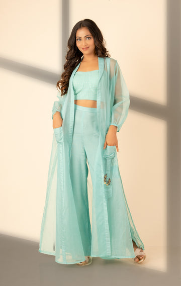 Sea green jacket with cotton bustier and flared pant