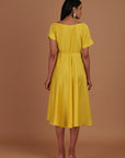 Yellow tunic calf length dress